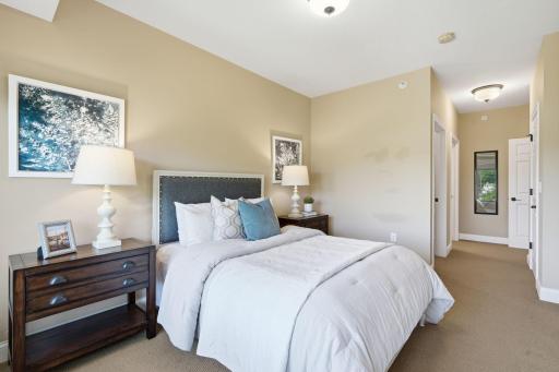 Primary suite with walk-in closet and private full bath