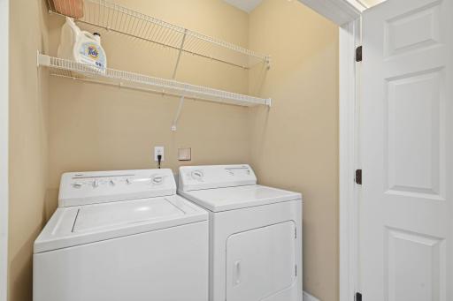 In-unit full size washer and dryer