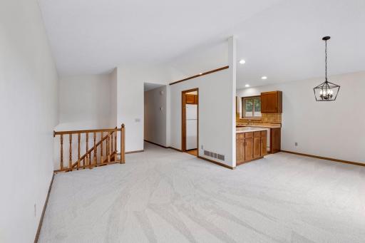 Living room opens to dining room and kitchen