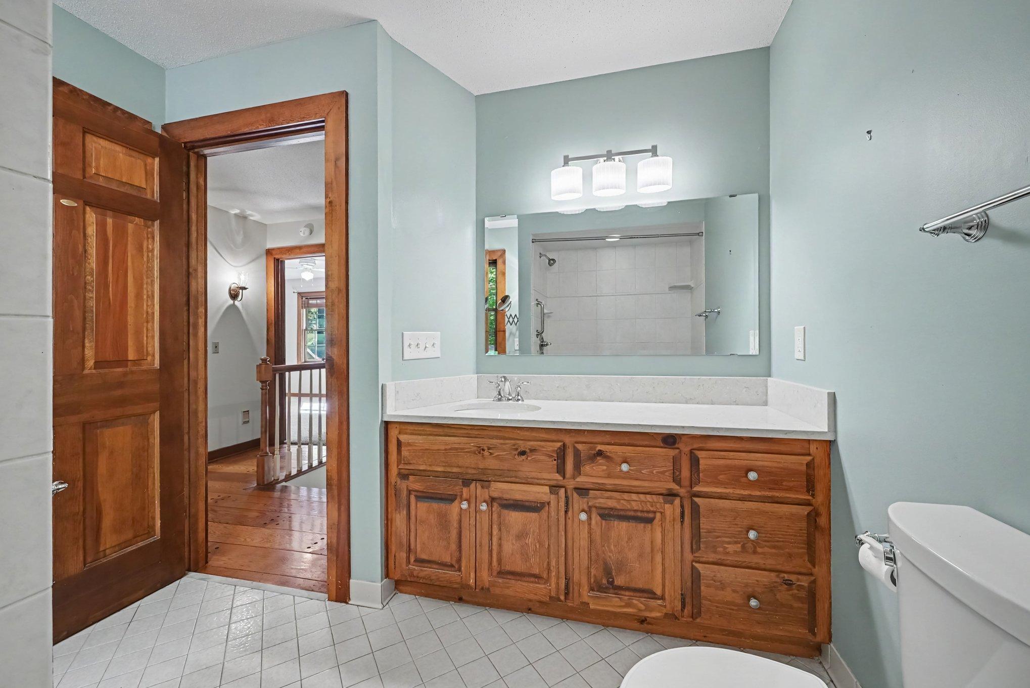 Clean and spacious full bath upstairs.