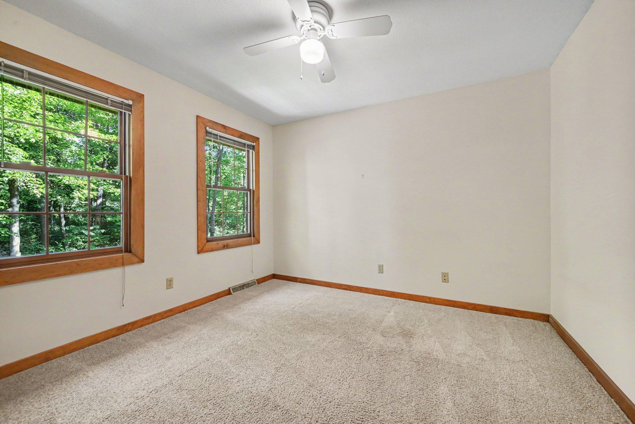 Bedroom #4 - Ceiling fans and quality woodwork.