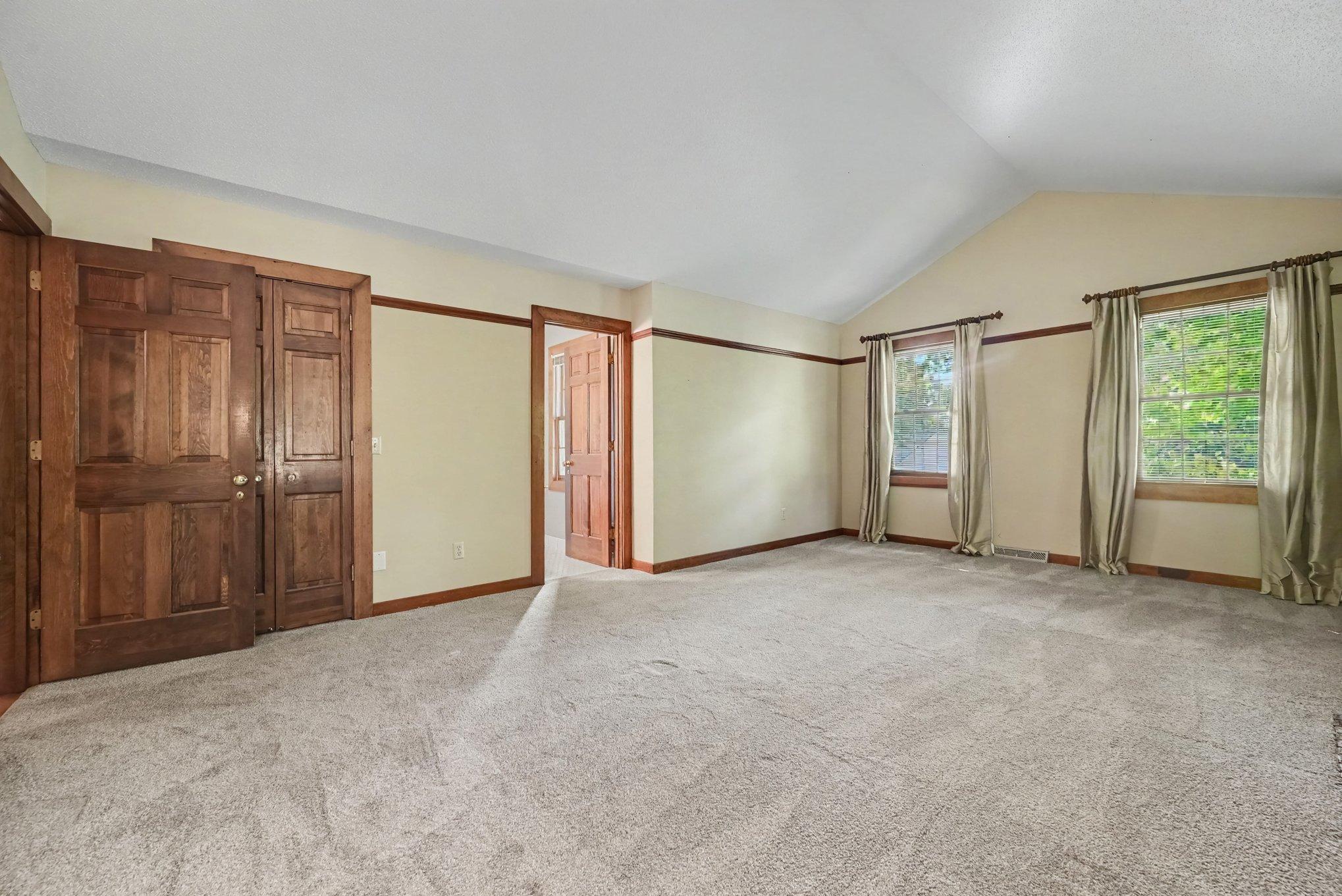 Walk in closet and attached 3/4 bath.
