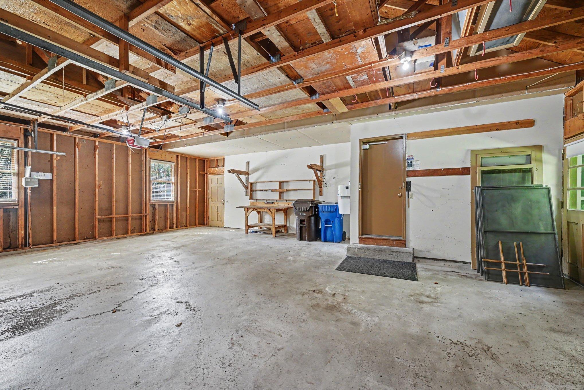 Huge 3 car garage with added workspace. Mudroom just inside garage.