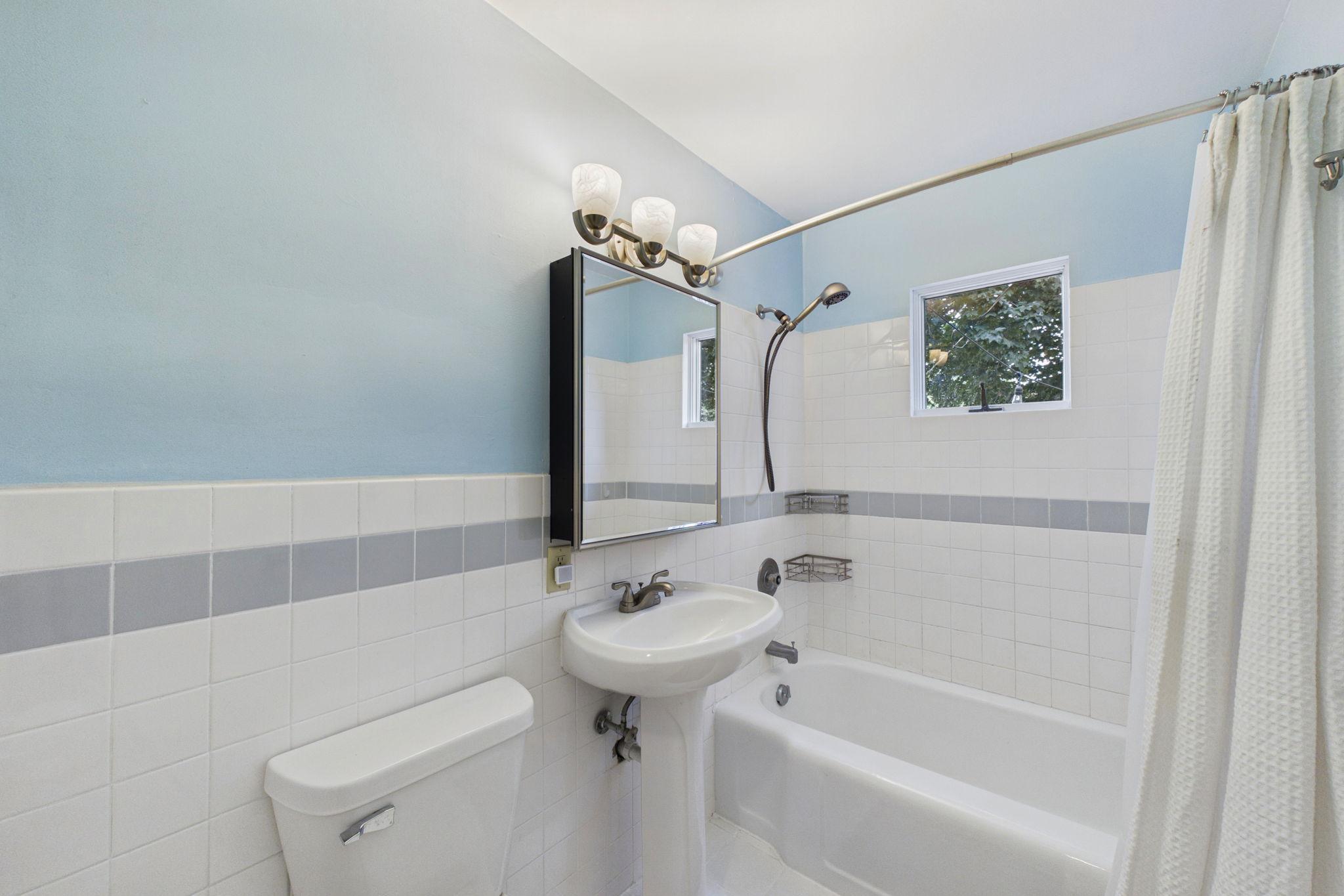 Updated bathroom with soaking tub.