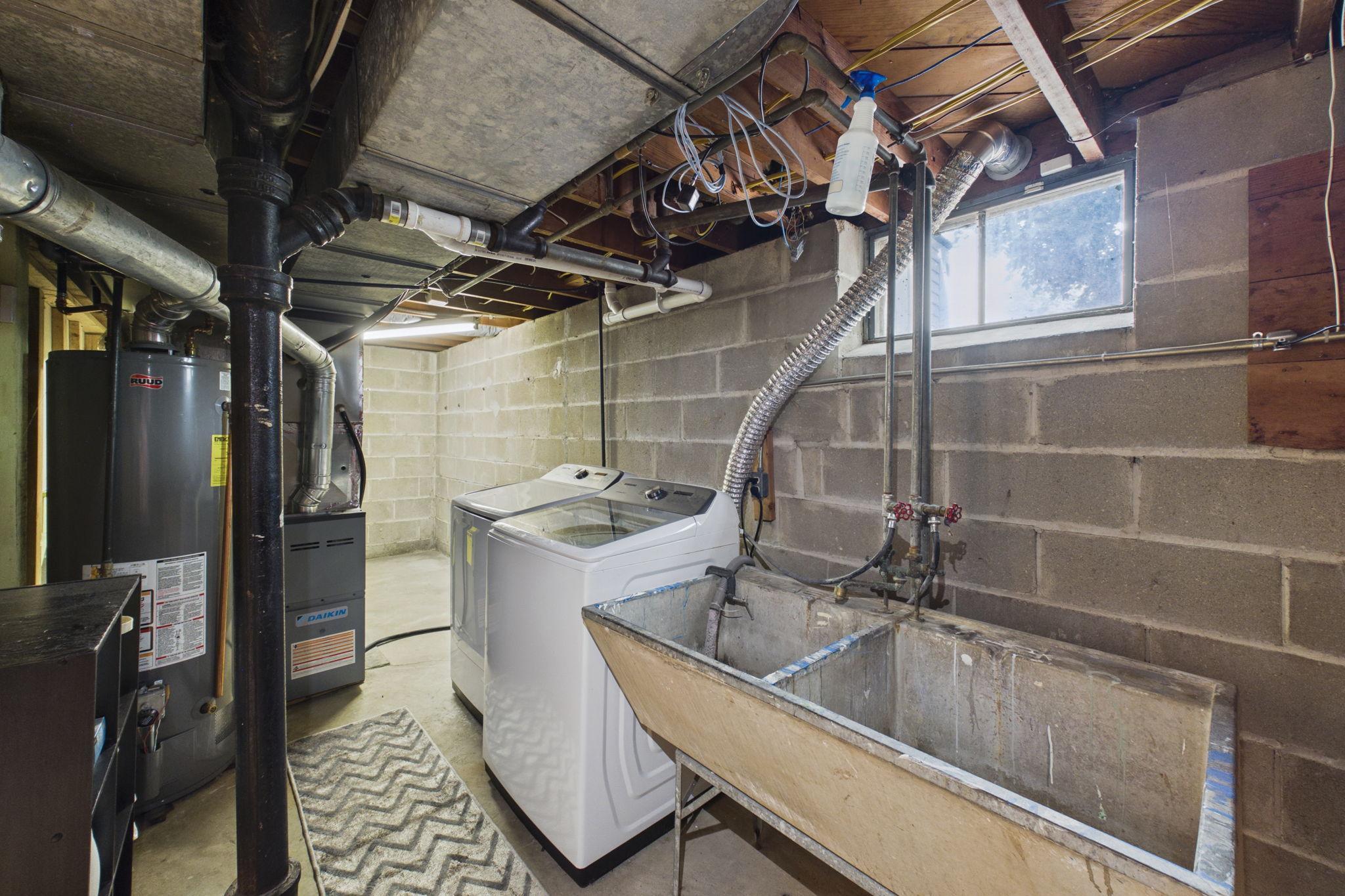 Washer , dryer & sink.