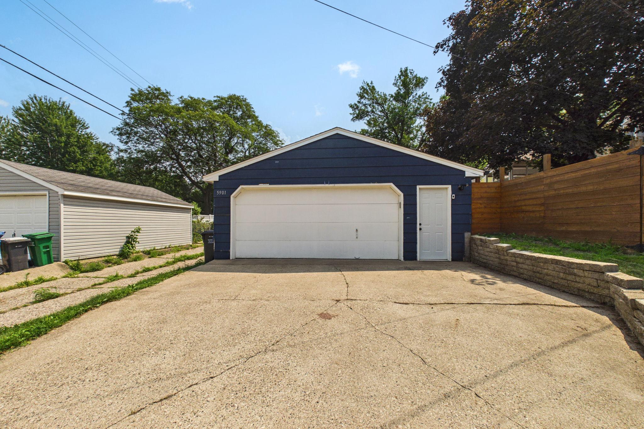 Private driveway to an over sized 2 car garage.