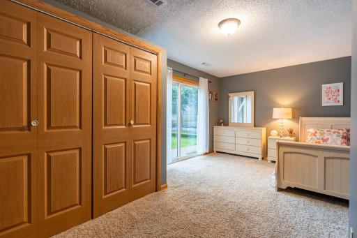 This bedroom has a spacious double closet.