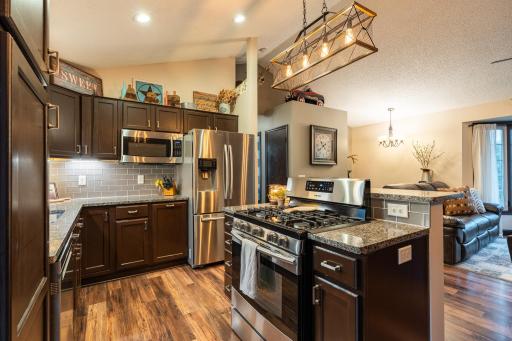 There is an abundance of cabinet space and features you'll appreciate like a pantry and pull out trash compartment.