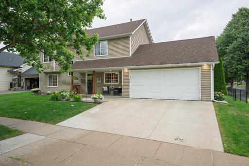 The new concrete driveway (2024) is extra wide to provide plenty of room for parking.