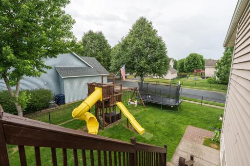 The yard is fenced and as you can see there is plenty of space for play equipment. The slides, swing and trampoline are not included.
