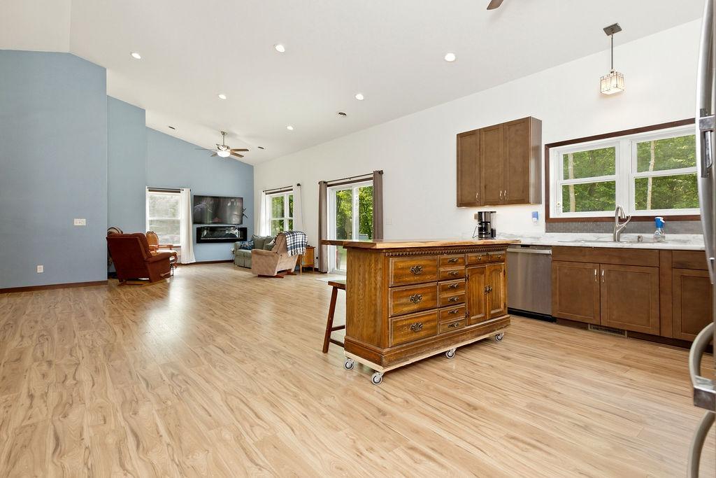 Kitchen view to Living Room & Patio door entry