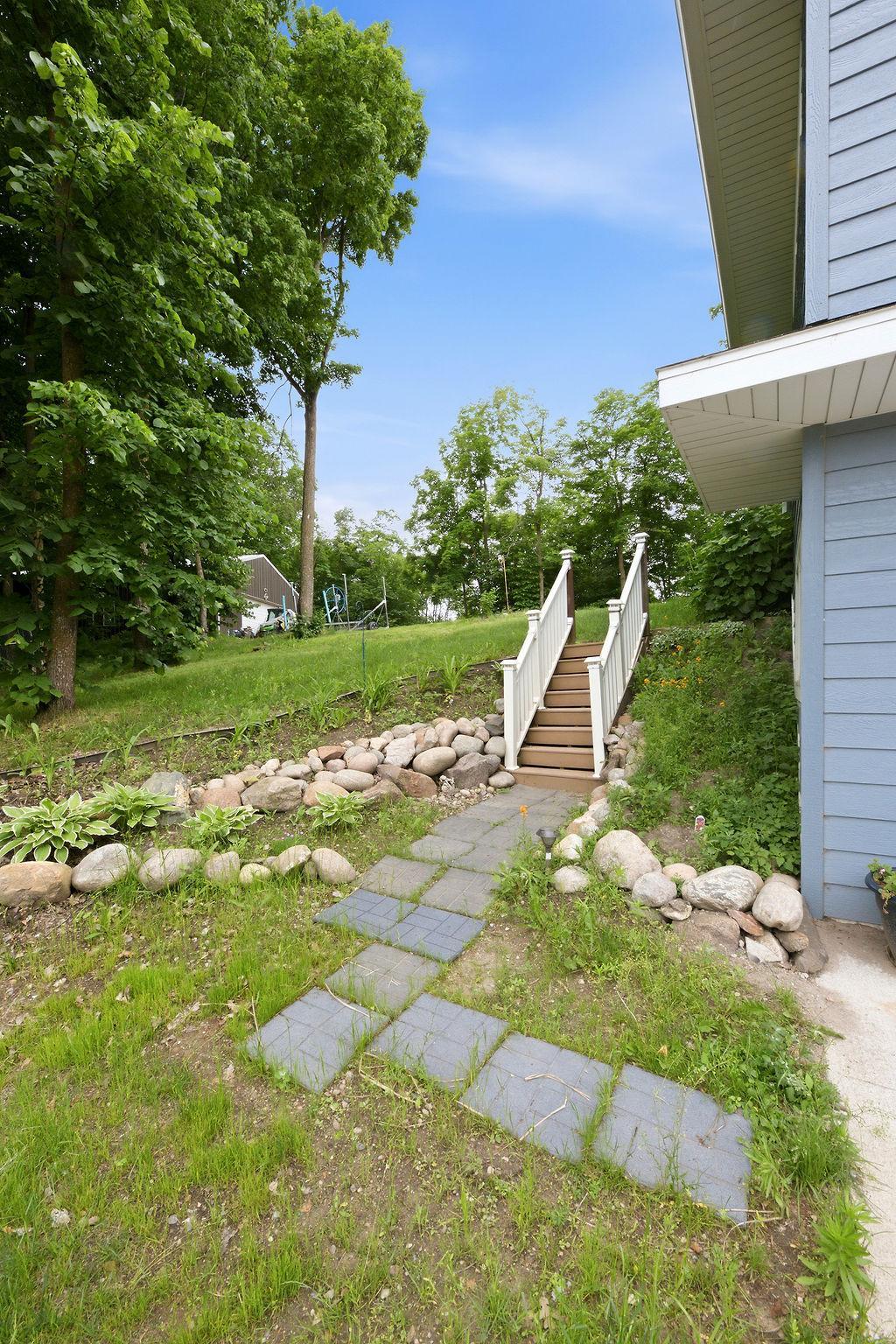 Stairs toward Pole Building area & up to Mudroom entrance