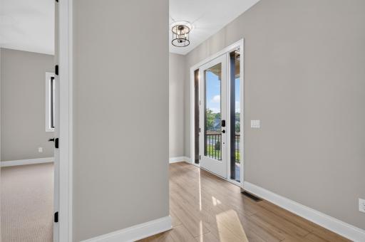 Entry features full glass entry door and sidelights