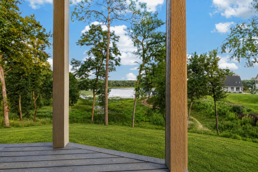 Enjoy some coffee on this covered patio ~ stunning views of Hanrehan Lake!