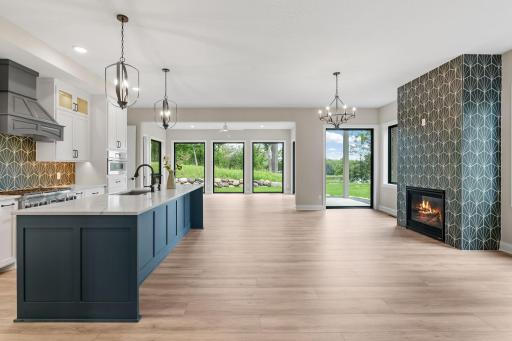 Great Room and Dining area feature floor to ceiling windows that provide stunning views of Hanrehan Lake!