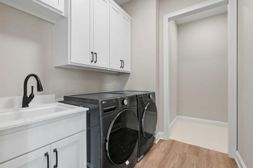 Laundry Room has access to both the Main Living Area and Master Closet