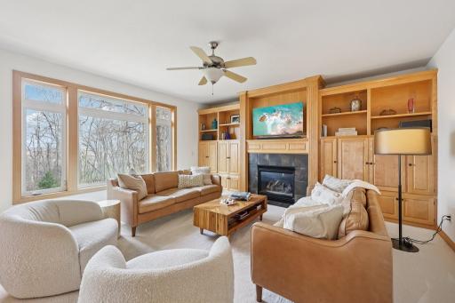 Custom built by Cuddigan Homes with gas fireplace providing cozy focal point