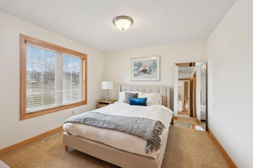 3rd upper level bedroom also features a walk-in closet
