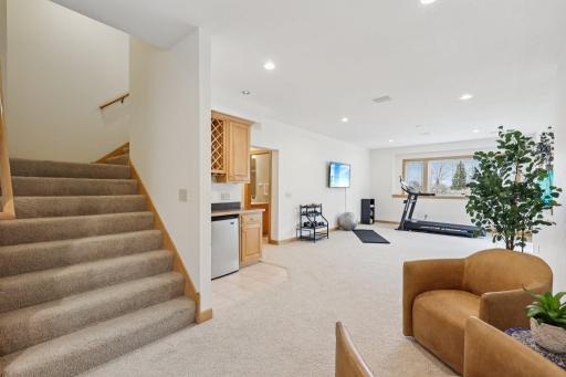 Walk-up bar with built-in wine rack and beverage refrigerator