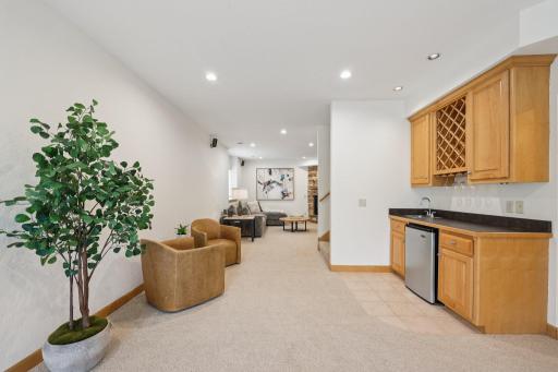Newer carpet in the lower level adds to the welcoming feel