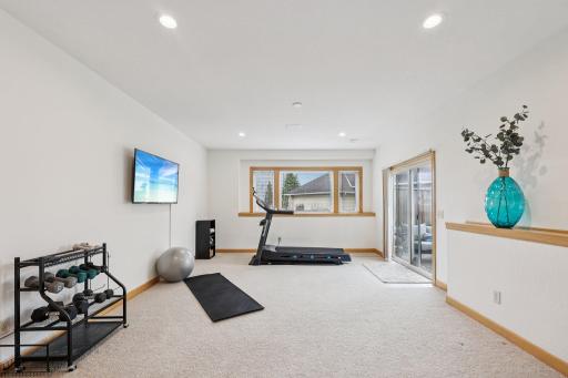 Step out to the back yard to the firepit and putting green