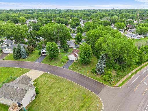 1242 Myrtle on a quiet cul-de-sac with several trees provides a private enclosed setting.