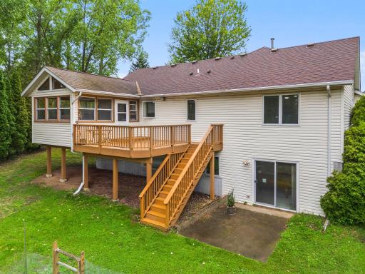Large 15X11 deck with stairs down to the backyard with 2 vegetable gardens