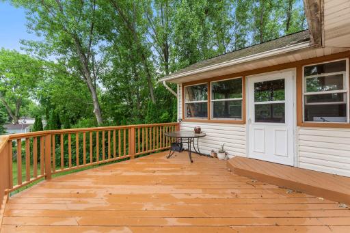 Large deck off of sun room porch is fun for entertaining