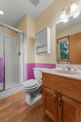 Primary bedroom has private 3/4 bath with window for natural lighting