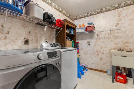Main floor laundry. Seller has replaced both the washer and dryer.