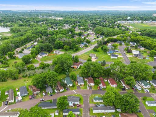 Rear view further away. Just to the left out of view is Beaver Lake Park with the lake and walking trails. At left in the far distance is downtown St Paul.
