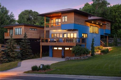 Example of a completed home by the same builder, located next door. Shown for reference onlyâfeatures and finishes of the new build are subject to change.