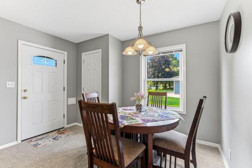 Compact entry closet offering quick, convenient storage that keeps the foyer tidy and organized.