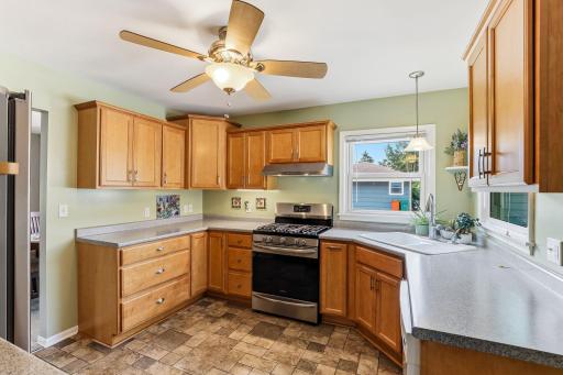 Clean, durable laminate flooring that adds a fresh, updated look to the kitchen.