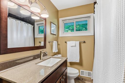 Updated main-floor bath featuring clean finishes, modern fixtures, and a polished look that elevates everyday comfort.