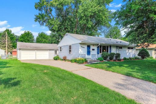 Spacious, well-kept detached garage offering room for multiple vehicles plus storage or workshop space.