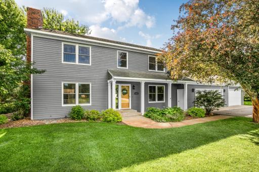 The expansive third-stall garage addition features LP SmartSide engineered wood siding.