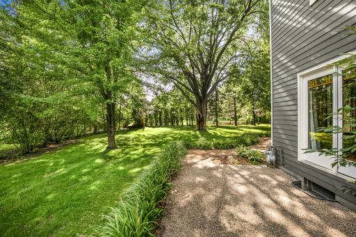 Surrounded by mature trees and professionally landscaped grounds, this property offers the perfect blend of comfort, functionality, and outdoor enjoyment.