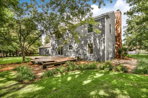 A spacious 14' x 18' wood deck overlooks two beautiful exposed aggregate concrete patios measuring 10' x 12' and 15' x 22'.