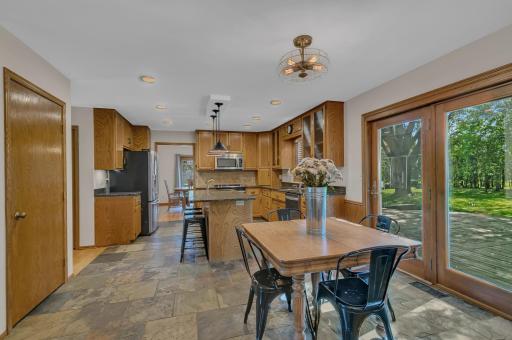 Informal dining room is perfect for the family for weekday meals.