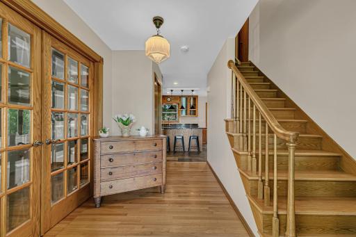 Just inside the foyer are elegant French doors that open into the living room.