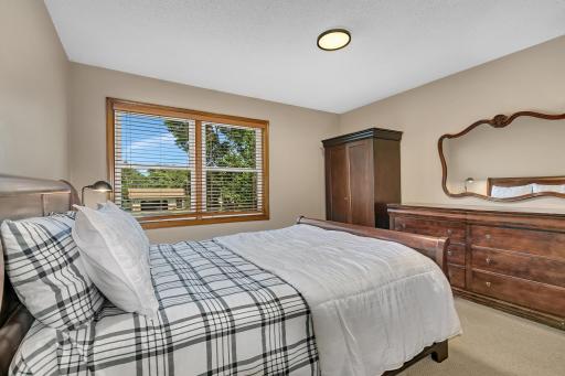 Two bedrooms feature dual-function lighting that provides both standard illumination and a convenient nightlight setting.