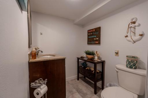 Half bath in basement also with granite countertop