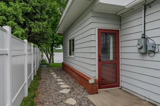 Path to backyard from side entrance near garage