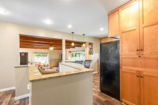 Great seating area in kitchen overlooking family room