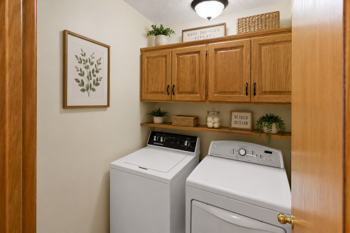 Main floor laundry=no more hauling baskets up & down stairs! New washer.