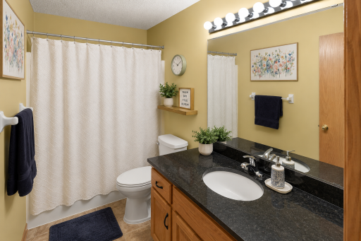 New granite counter-top in the full main floor bathroom