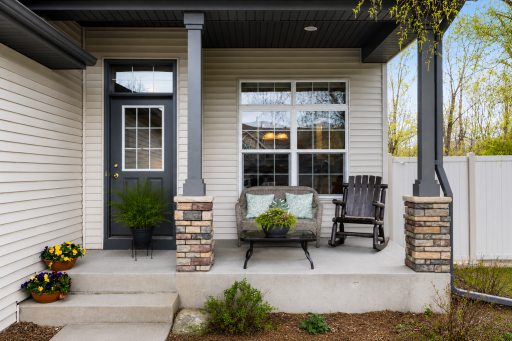 A welcoming front porch perfect for morning coffee or neighborhood chats or evening relaxation.