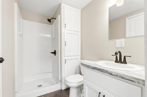 Upper level 3/4 bathroom with walk-in shower