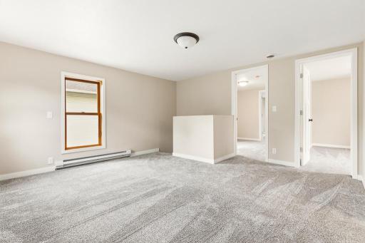 Upstairs features a generous landing that you can tailor to your wants and needs. This would be a great little entertainment area or secondary living room.